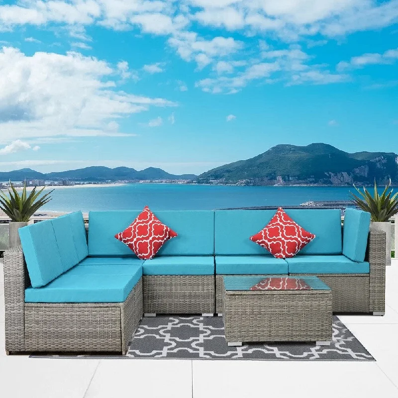 7-piece Wicker Outdoor Furniture Set with Blue Cushions and Glass Table