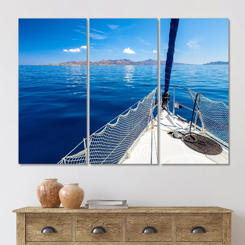 Designart "Sail Boat Yacht In Open Blue Sea Near Island" Nautical & Coastal Canvas Wall Art Print